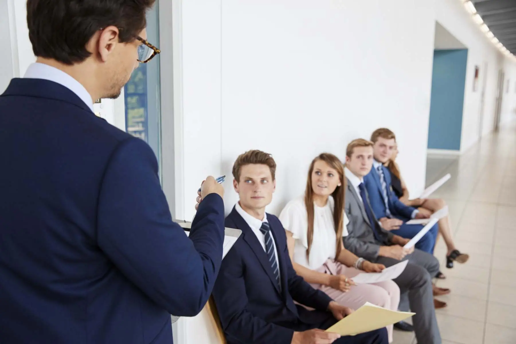 Consultant presenting to business clients Belinos Consulting London