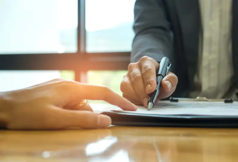 Signing a business contract Belinos Consulting board reporting London